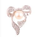 Mode arc cristal et bijoux broches de perle